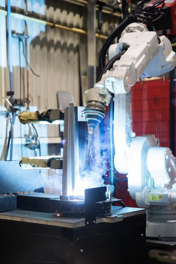 A welding robot at work
